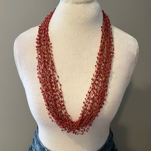 Bohemian style beaded, and rope necklace